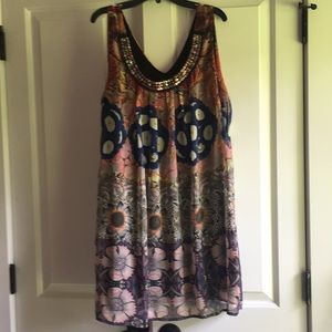 Shift dress with jeweled neckline. Knee length